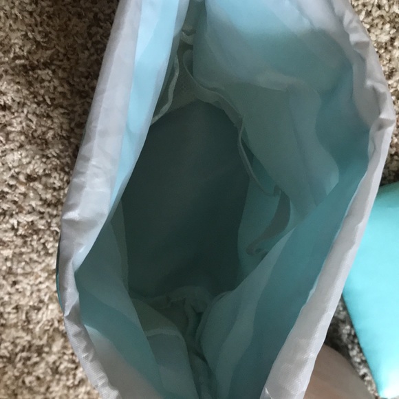 Two “Wind Blows River Flows” cosmetic bags. Each has draw string top. - Picture 3 of 6